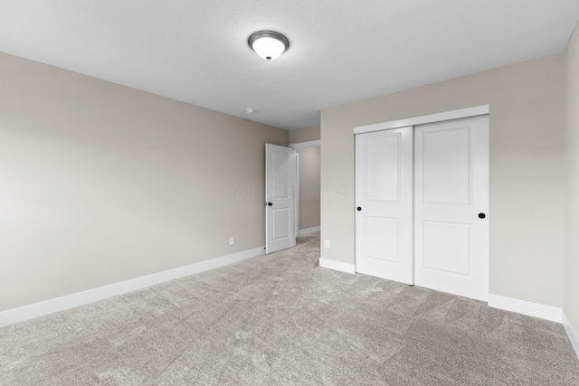 1206 Clover St, Sunbury, OH 43074 - unfurnished bedroom featuring baseboards, carpet flooring, and a closet