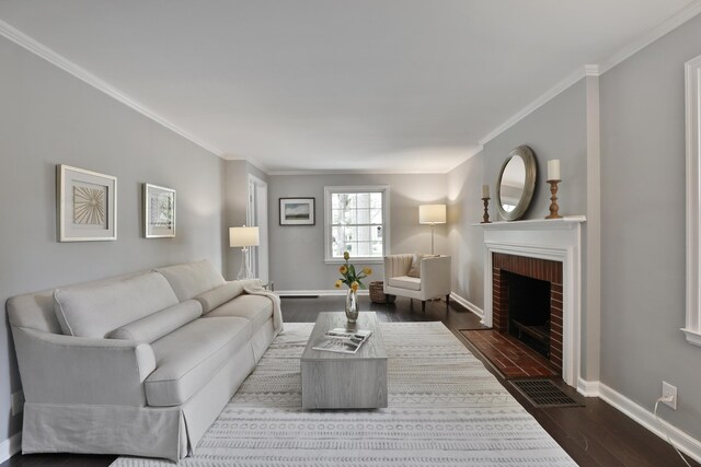 living room with crown molding, dark wood-type flooring, a fireplace, and baseboards