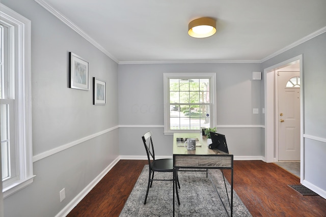office area featuring wood finished floors, ornamental molding, and baseboards