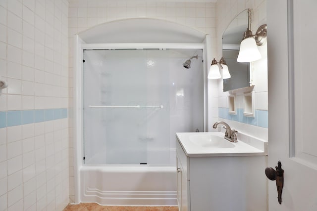 full bath with vanity and washtub / shower combination
