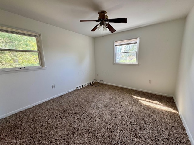 25 N Liberty St, New Concord, OH 43762 - carpeted empty room featuring ceiling fan and baseboards