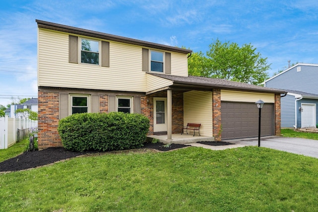 view of front of home with an attached garage, asphalt driveway, and brick siding