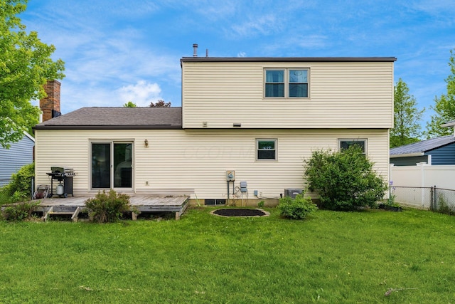 back of house featuring a deck and central air condition unit