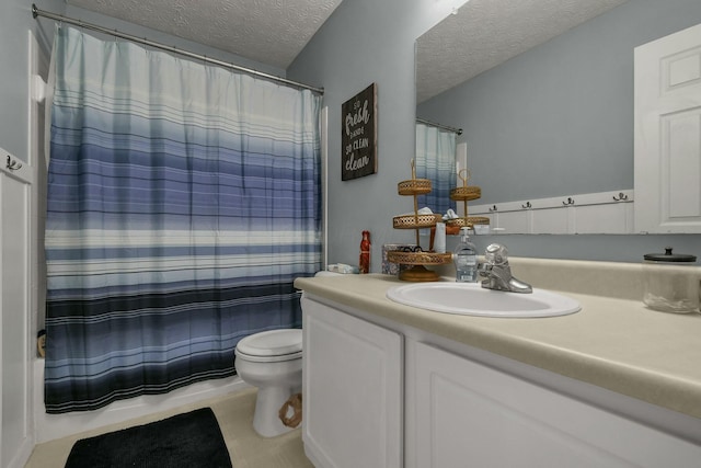 bathroom featuring vanity, shower / bath combo, toilet, and a textured ceiling