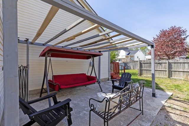 view of patio with fence and a pergola