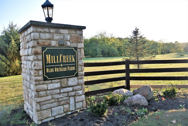 community sign with fence