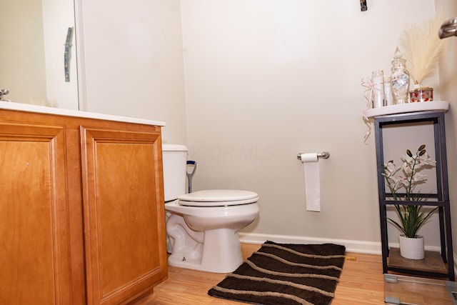 105 Autumn Ter SW, Etna, OH 43062 - half bath featuring baseboards, toilet, and wood finished floors