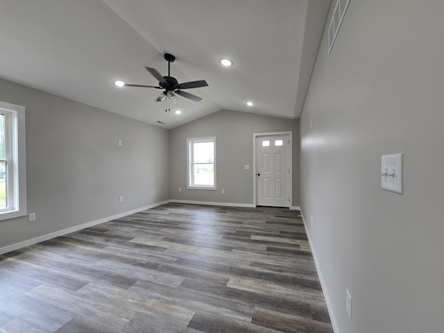 interior space with visible vents, baseboards, recessed lighting, a ceiling fan, and vaulted ceiling