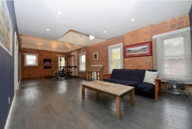 1033 Franklin Ave, Columbus, OH 43205 - living area with brick wall, wood finished floors, and recessed lighting