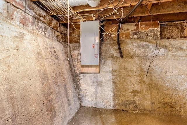 unfinished below grade area with electric panel