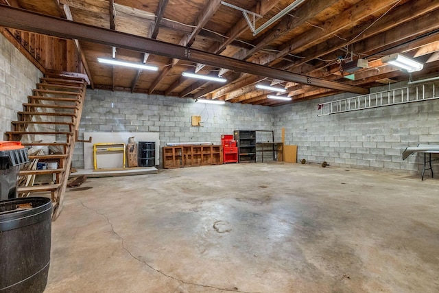 basement featuring concrete block wall