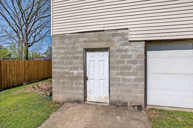 doorway to property with fence