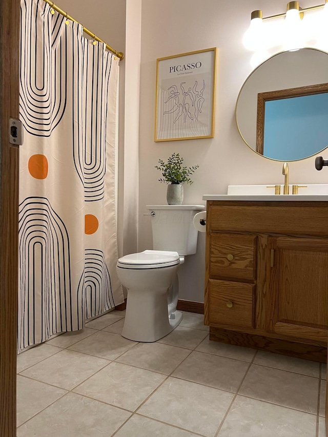 bathroom featuring tile patterned floors, vanity, toilet, and a shower with shower curtain