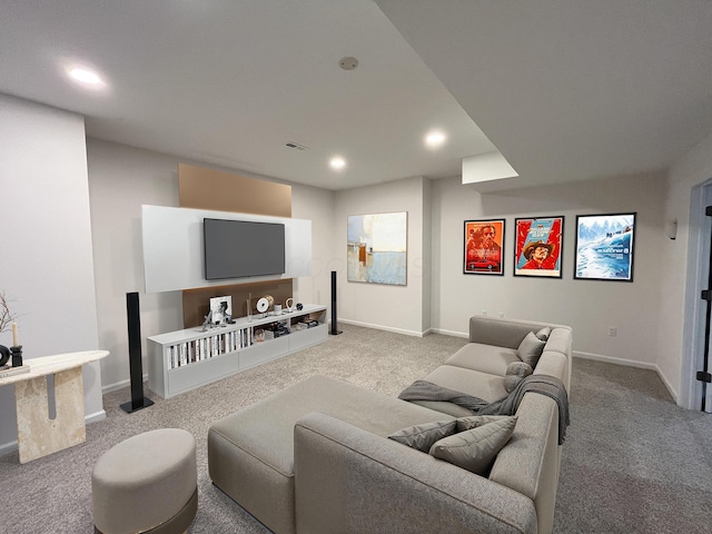 carpeted living room featuring baseboards, recessed lighting, and visible vents