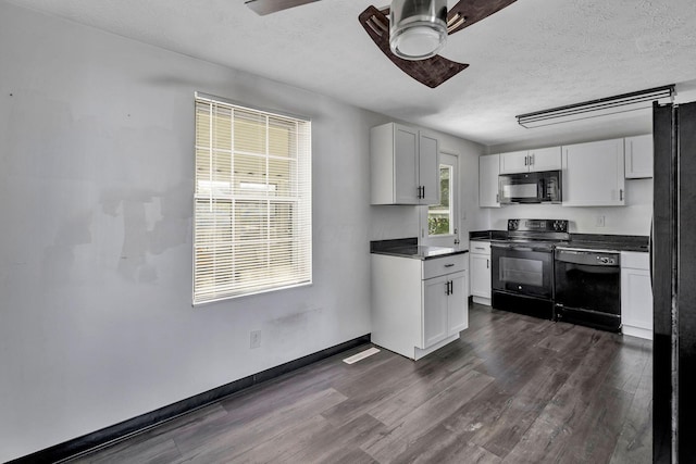 2987 Olivette Rd, Columbus, OH 43232 - kitchen with black appliances, a ceiling fan, dark wood-style flooring, a textured ceiling, and white cabinetry