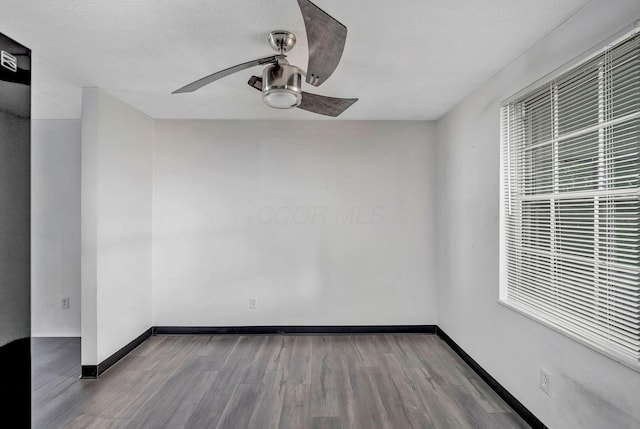 2987 Olivette Rd, Columbus, OH 43232 - spare room with a ceiling fan, wood finished floors, and baseboards