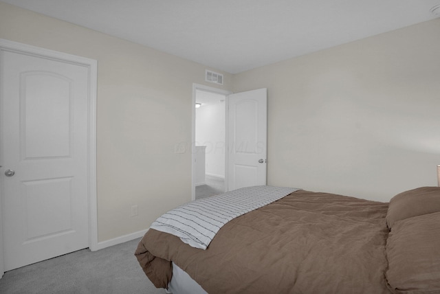 bedroom featuring carpet flooring, baseboards, and visible vents