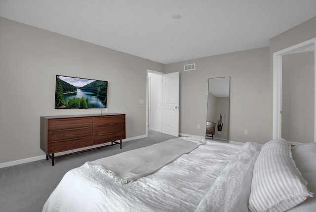 bedroom with baseboards, carpet, and visible vents