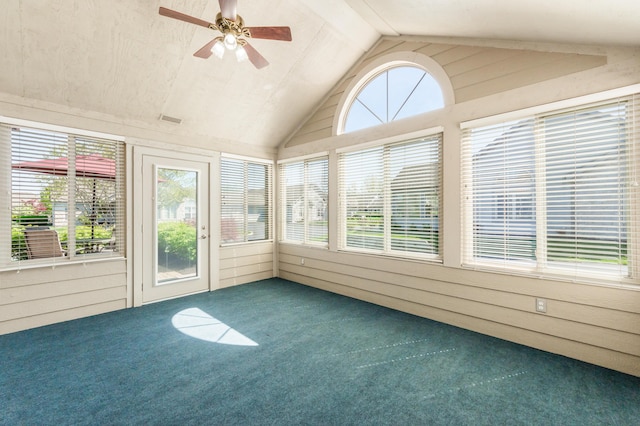 unfurnished sunroom featuring visible vents and a ceiling fan