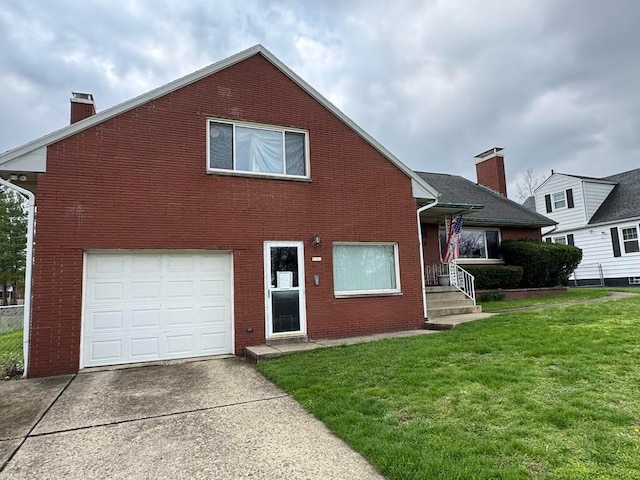 view of front of home featuring concrete driveway, a chimney, a front yard, and brick siding