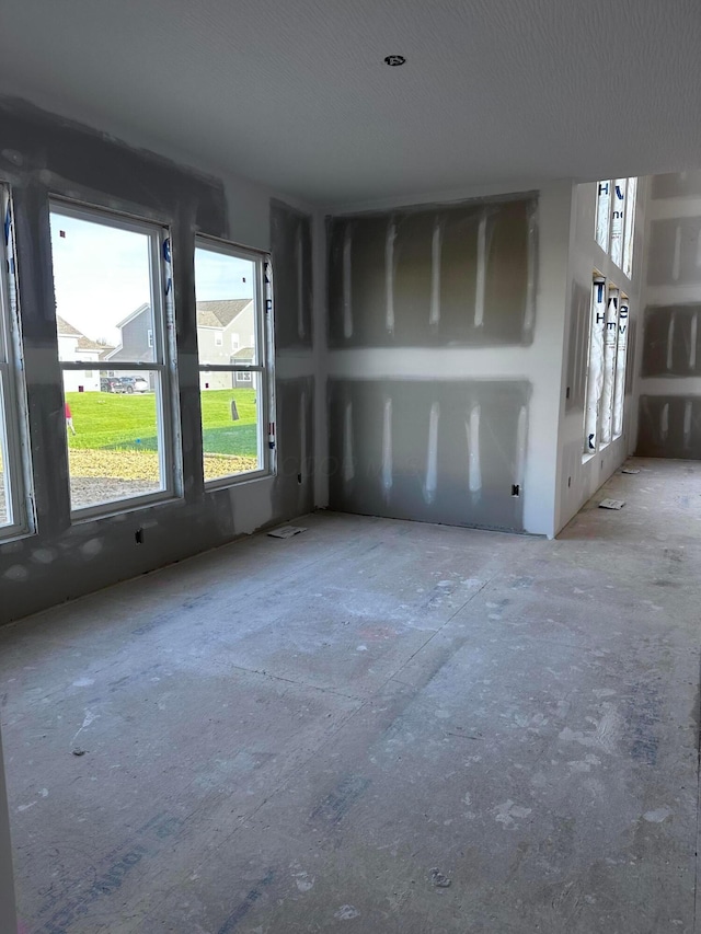 spare room featuring a healthy amount of sunlight