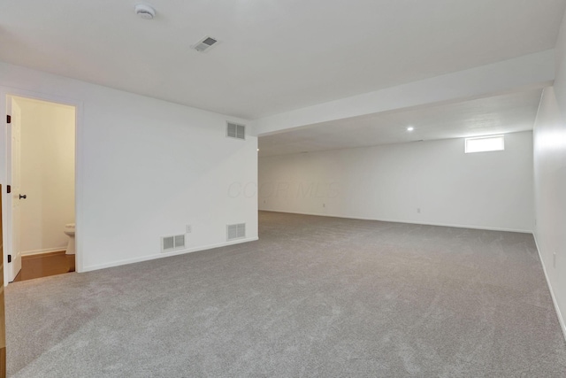 interior space with visible vents and carpet floors