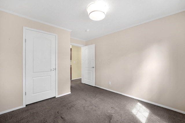 7320 Partridge Dr, Dublin, OH 43016 - unfurnished bedroom featuring baseboards, carpet floors, and crown molding