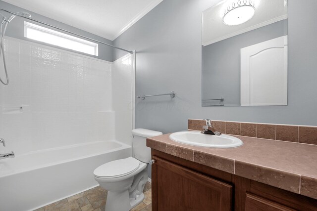 7320 Partridge Dr, Dublin, OH 43016 - full bath with stone finish floor, toilet, vanity, washtub / shower combination, and crown molding