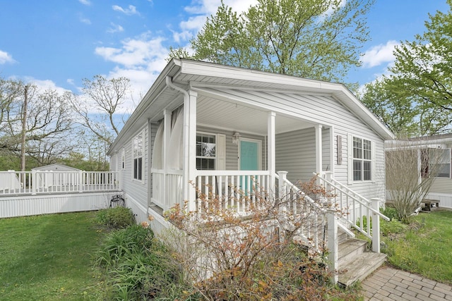 7320 Partridge Dr, Dublin, OH 43016 - view of front facade featuring covered porch and a front lawn