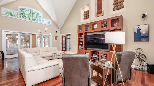 87 Dartmouth Rd SE, Hebron, OH 43025 - living room featuring high vaulted ceiling and wood finished floors
