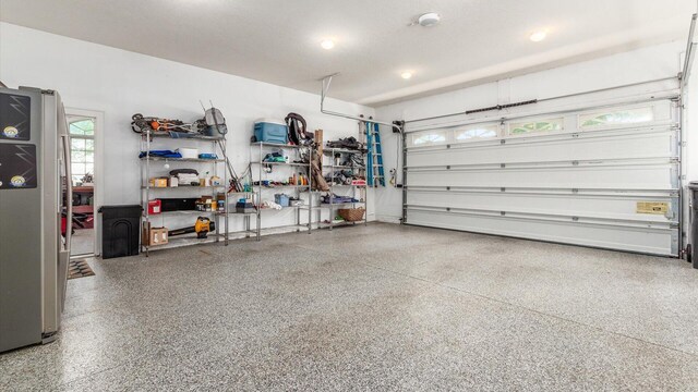 87 Dartmouth Rd SE, Hebron, OH 43025 - garage featuring recessed lighting
