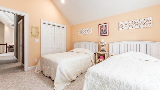 87 Dartmouth Rd SE, Hebron, OH 43025 - bedroom featuring baseboards, light colored carpet, a closet, and vaulted ceiling