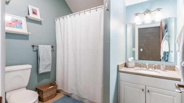 87 Dartmouth Rd SE, Hebron, OH 43025 - bathroom featuring toilet, a shower with curtain, and vanity