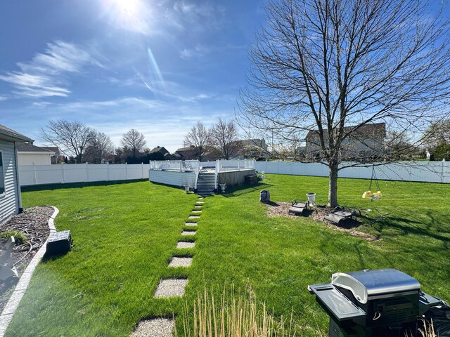 view of yard featuring a fenced backyard
