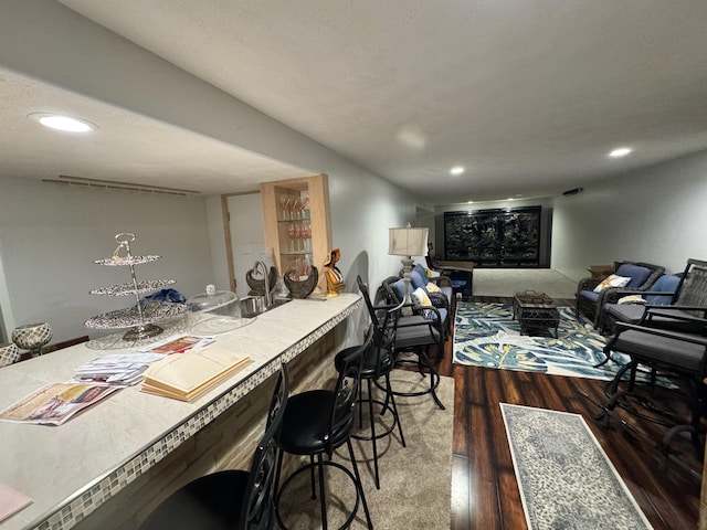 dining area featuring recessed lighting, visible vents, and wood finished floors