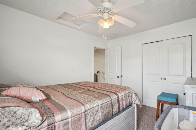 carpeted bedroom featuring a closet and ceiling fan