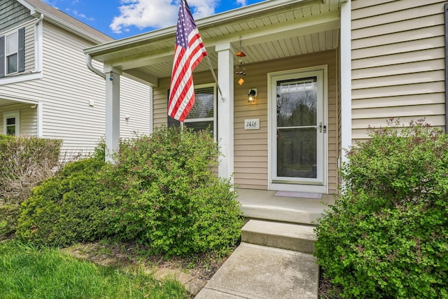 entrance to property with a porch