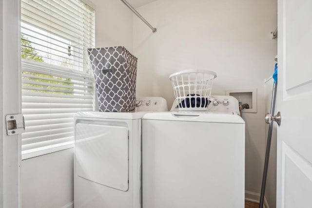clothes washing area with laundry area and independent washer and dryer