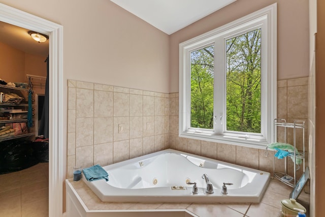 4611 Meghans Run, Batavia, OH 45103 - full bath with tile patterned flooring, a spacious closet, lofted ceiling, and a jetted tub