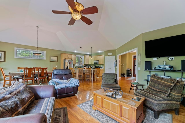 4611 Meghans Run, Batavia, OH 45103 - living area featuring light wood-style flooring, ceiling fan, and vaulted ceiling