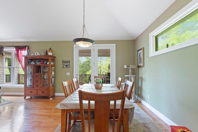 4611 Meghans Run, Batavia, OH 45103 - dining space featuring light wood-style floors, baseboards, and vaulted ceiling