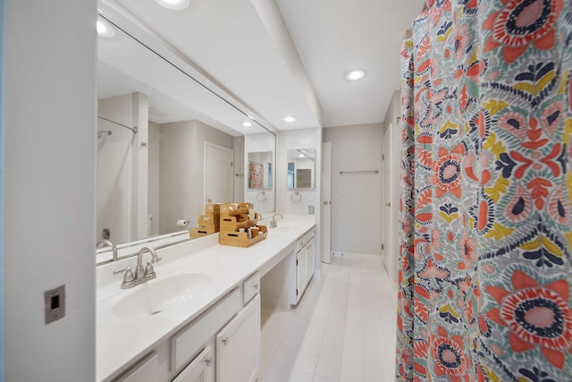 bathroom with recessed lighting, a sink, tile patterned floors, and curtained shower