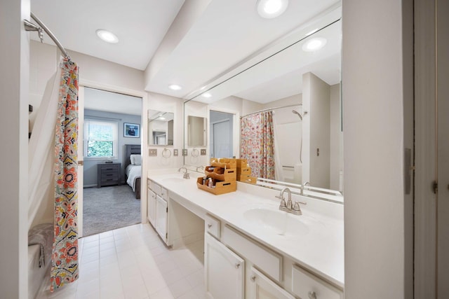 bathroom featuring double vanity, a shower with shower curtain, recessed lighting, tile patterned floors, and a sink