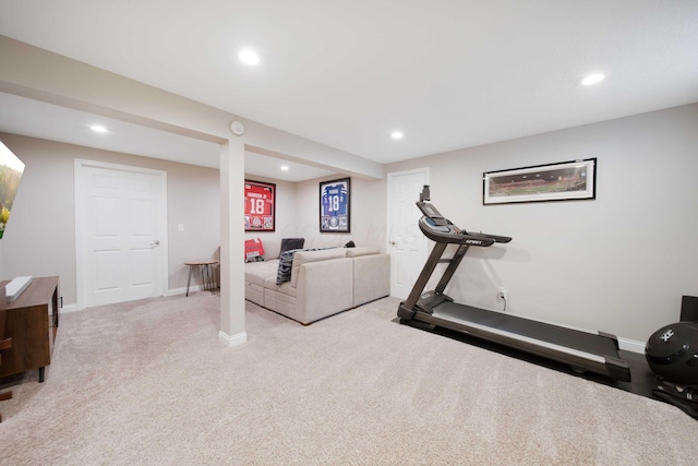 exercise room featuring carpet floors, baseboards, and recessed lighting