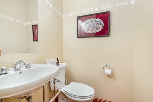 1917 Nichole Cir, Lancaster, OH 43130 - half bath featuring toilet and a sink