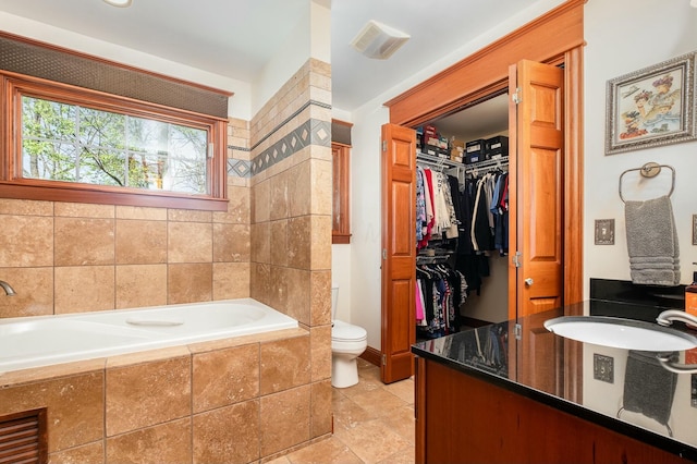 1917 Nichole Cir, Lancaster, OH 43130 - full bath with a spacious closet, toilet, a sink, visible vents, and a garden tub