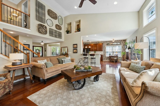 6767 Burnside Ln, Dublin, OH 43016 - living room featuring high vaulted ceiling, wood finished floors, and ceiling fan