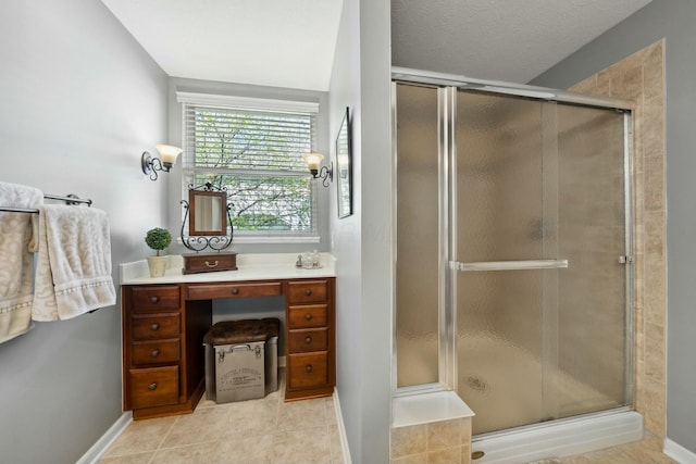6767 Burnside Ln, Dublin, OH 43016 - full bathroom with tile patterned floors, a stall shower, and baseboards