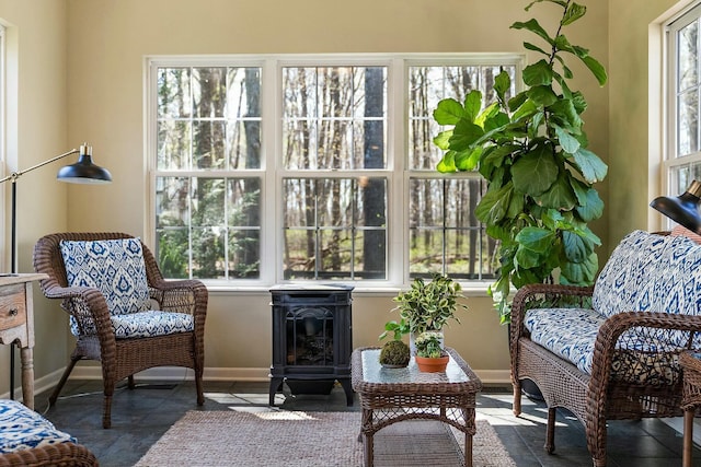 6767 Burnside Ln, Dublin, OH 43016 - sunroom / solarium featuring a wood stove