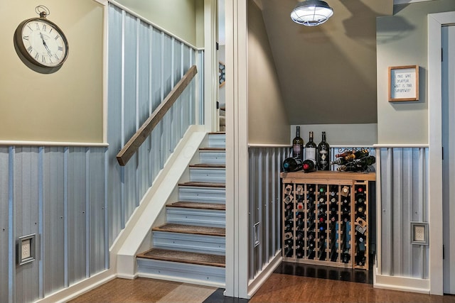 6767 Burnside Ln, Dublin, OH 43016 - wine cellar with wood finished floors and a wainscoted wall